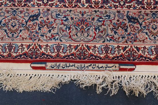 A fine Tabriz blue ground rug, 7ft 10in by 4ft 10in.